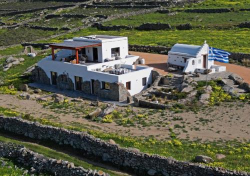 an aerial view of a house in a field at Ktima Lipsi, Panorama Pool Views in Klouvas