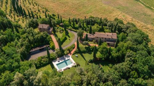 an aerial view of a estate with a swimming pool at Podere Fignano, holiday home - apartments renovated 2024 - new swimming pool in Montaione