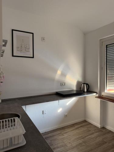 a kitchen with a counter top and a sink at Apartment Rotenburg in Rotenburg an der Fulda