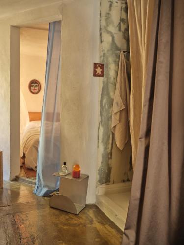 a room with a room with a bed and a window at Noura Residency City Apartment II in Copenhagen