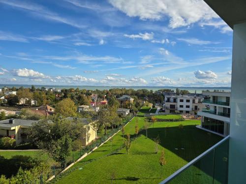 a view from the balcony of a building at Hotel Vinifera Wine & Spa 5 Stars Superior in Balatonfüred