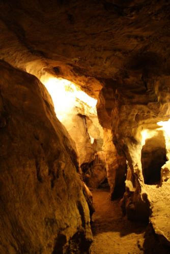 a dark cave with a path in it at Casa d' Artista B&B in Ozieri