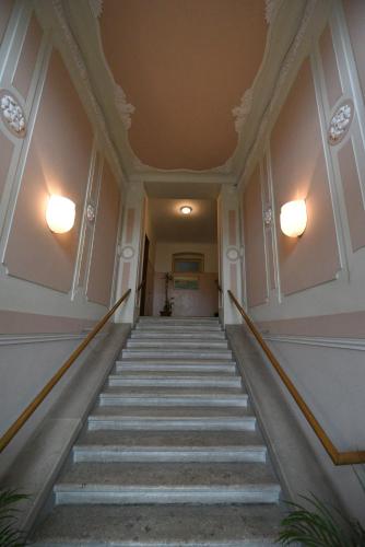 a flight of stairs in a building at B&B Al Giardino Leonor in Trieste