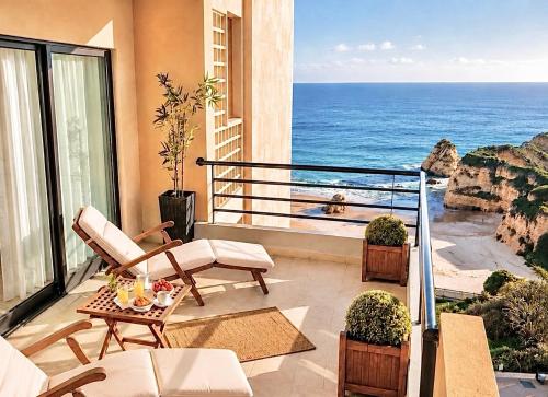 a balcony with a view of the ocean at MyOcean Luxury l Huge Panoramic Sea View Balcony & Private Garage in Portimão