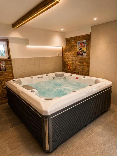 a jacuzzi tub in a bathroom at Villa Retró Harmónia in Visegrád