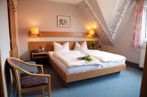 Ένα ή περισσότερα κρεβάτια σε δωμάτιο στο Landhotel Weining