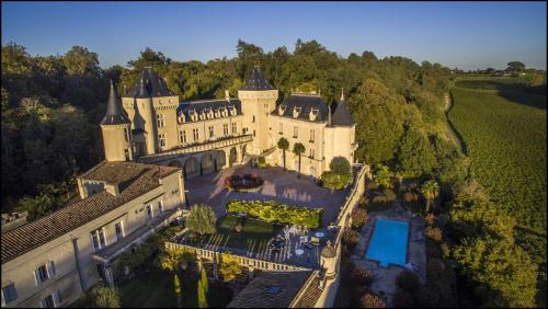 an aerial view of a castle at CHATEAU DE LA RIVIERE in La Rivière
