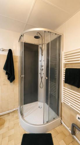 a glass shower in a bathroom with at Studio centre-ville avec ascenseur - Le Mistral in Digne-les-Bains