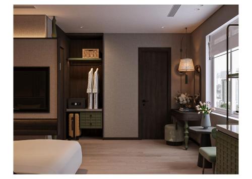 a living room with a door and a table at DUHORÉA Hotel and Wellness in Hanoi