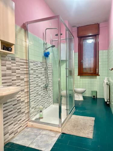 a bathroom with a shower and a toilet at Venice Night B13 in Mestre