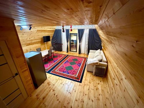 an overhead view of a living room in a log cabin at A-Frame in Dolinka