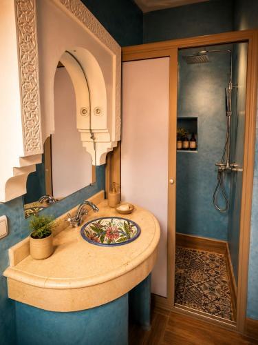 a bathroom with a sink and a mirror at Villa lumina , Marrakech in Oulad Mazoug