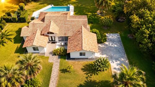 an aerial view of a house with a pool at SWISS 42 - Golf Course in Clermont