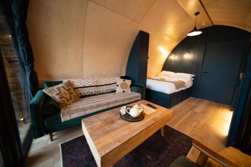 an overhead view of a room with a couch and a table at Hillend by Wigwam Holidays in Todmorden