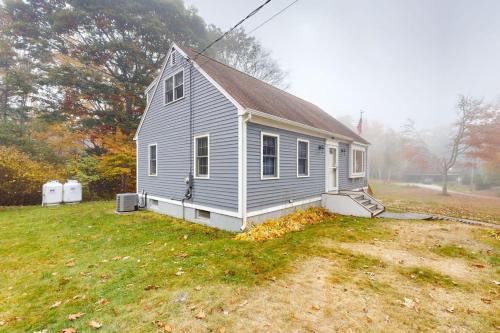 a small house sitting on top of a field at Boothbay Harbor Home with Water Views | Near Dining & Whale Watching in Boothbay Harbor