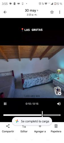 a picture of a living room with a couch at Arena & mar in Las Grutas