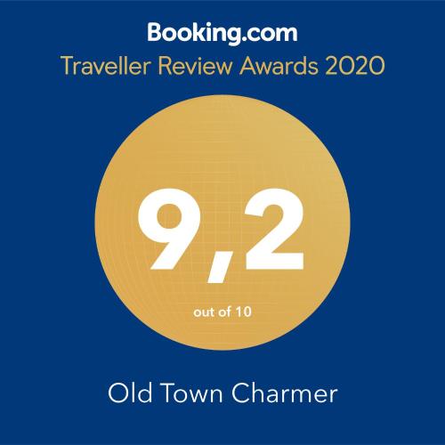 a vector illustration of a yellow circle with the number and the text travel review at Old Town Charmer in Poreč