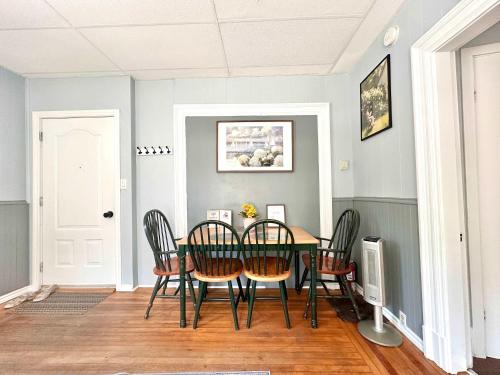 a dining room with a table and chairs at King Bed 2BR near the LaHave River and Trails in Bridgewater