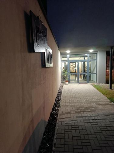 an empty hallway of a building at night at Penzión Alma in Poprad