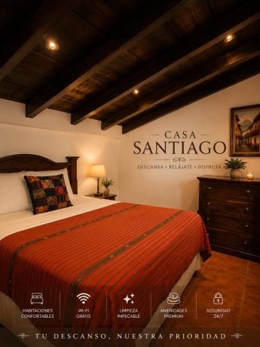 a bedroom with a bed with a sign on the wall at Casa Santiago Son 2 in Antigua Guatemala