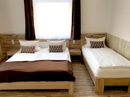 Кровать или кровати в номере City Central Promenade