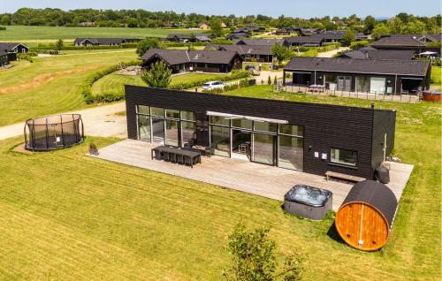 an overhead view of a house with a wooden deck at Gorgeous Home In Odder With Wifi in Odder