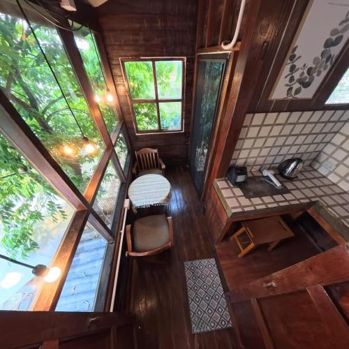 an overhead view of the inside of a tiny house at Mocha Latte Homestay & Cafe in Chiang Rai