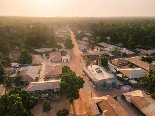 an aerial view of a small town with buildings at SEN-CASA- TOURiSME in Kabadio