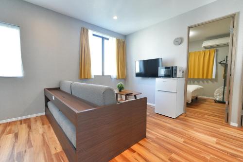 ZJ401 Top-Floor 1BR Home with Living Room and Kitchen, Double Bed and Sofa Bed