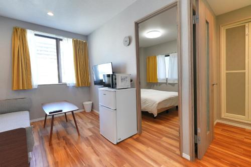 ZJ401 Top-Floor 1BR Home with Living Room and Kitchen, Double Bed and Sofa Bed