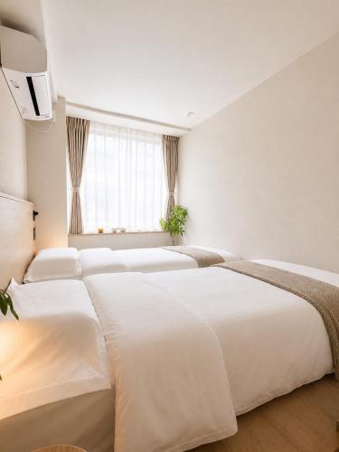ISSHUKU NOMA御徒町III301 - Twin Room