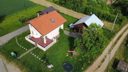an overhead view of a house with an orange roof at Kuća za odmor Brlog in Otočac