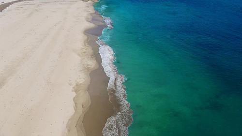 an aerial view of the beach and the ocean at Ocean view JUN in Shima
