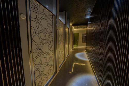 a hallway with a door with a design on it at Tryp By Wyndham Istanbul Sancaktepe in Istanbul