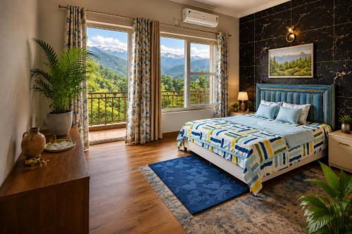 a bedroom with a bed and a large window at SAAR Palampur Villa 5 BHK With Dhauladhaar Mountains View in Pālampur