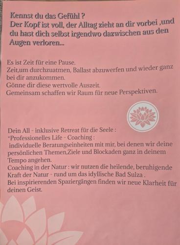 a page of a letter with a poem on a pink paper at Tinyhaus Wolkenlos Familie Hamdorf in Bad Sulza