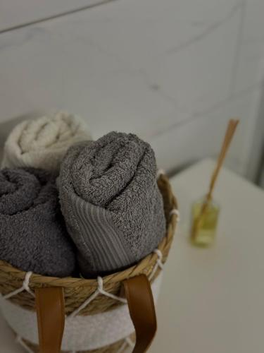 a basket filled with towels on top of a table at BrusNica in Gornji Milanovac