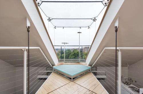 a room with a view of a bathtub in a bathroom at West End Townhouse in Edinburgh