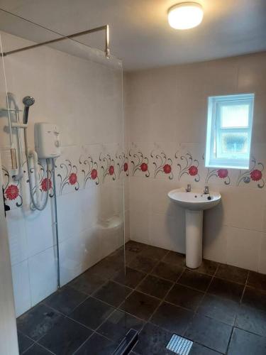 a bathroom with a sink and a shower at Beautiful 1-Bed Apartment in Sandy in Sandy