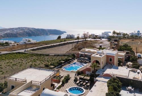 an aerial view of a villa with a swimming pool at Abelonas Village in Megalochori