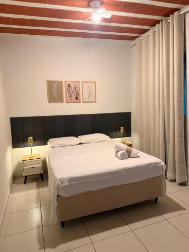a bedroom with a bed in a room at Studio completo em Diamantina-MG in Diamantina