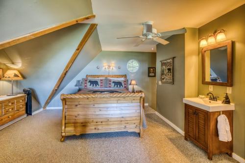 a bedroom with a bed and a sink in a room at Spectacular Mountain View - Cloud 9 - HotTub-PETS OK in Cleveland
