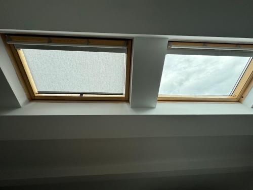 a window in a room with a white ledge at Mansarda al mare in Tortoreto Lido