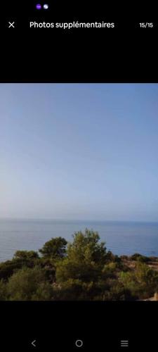 a screenshot of a picture of the ocean at Appartement F3 aich el vez in Bejaïa