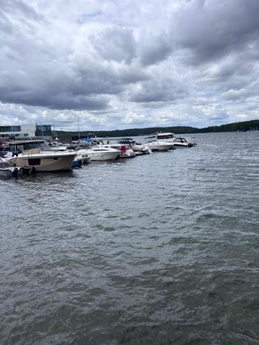 a group of boats docked in a body of water at Nad Zatoką Apartament 340 in Olsztyn