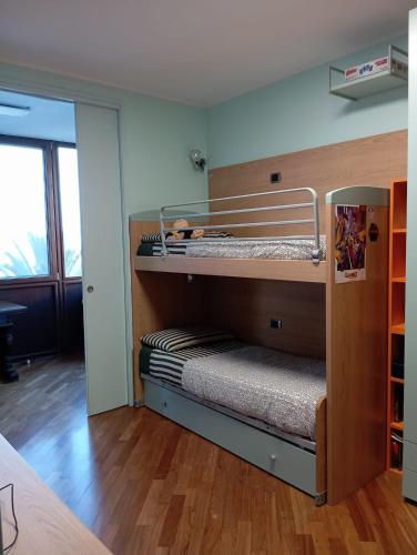 a room with two bunk beds in a room at appartamento in Bisceglie