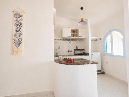 Nhà bếp/bếp nhỏ tại La Planque - Appart Hôtel - Vue sur mer