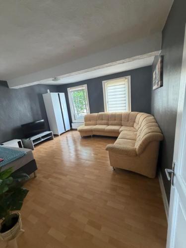a large living room with two couches in it at Diezer Apartments II City in Diez