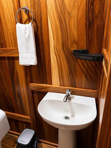 a bathroom with a sink and a toilet at House Rio Celeste Paradise in Rio Celeste