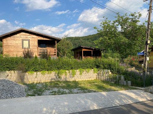a house on the side of a road at Bungalouri Olanesti in Băile Olăneşti